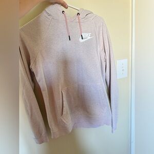 Nike Women's Light Pink Hoodie
PET AND SMOKE FREE